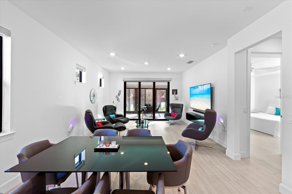 6713 Alstead Circle Lakewood Ranch, FL 34202 - Photo 12 of 86 a living room with furniture and a large window