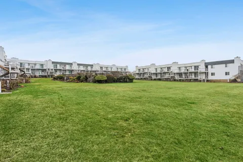 a view of a city with tall buildings in the background