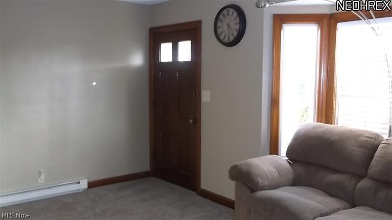 4335 7th Street Northwest Canton, OH 44708 - Photo 8 of 21 Entry door. This home features baseboard electric heat for added comfort and very clean for those with allergies.