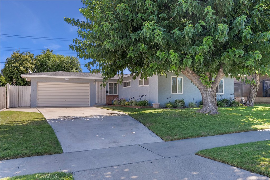 4035 Wayne Court Riverside, CA 92504 - Photo 1 of 1 a front view of a house with a garden