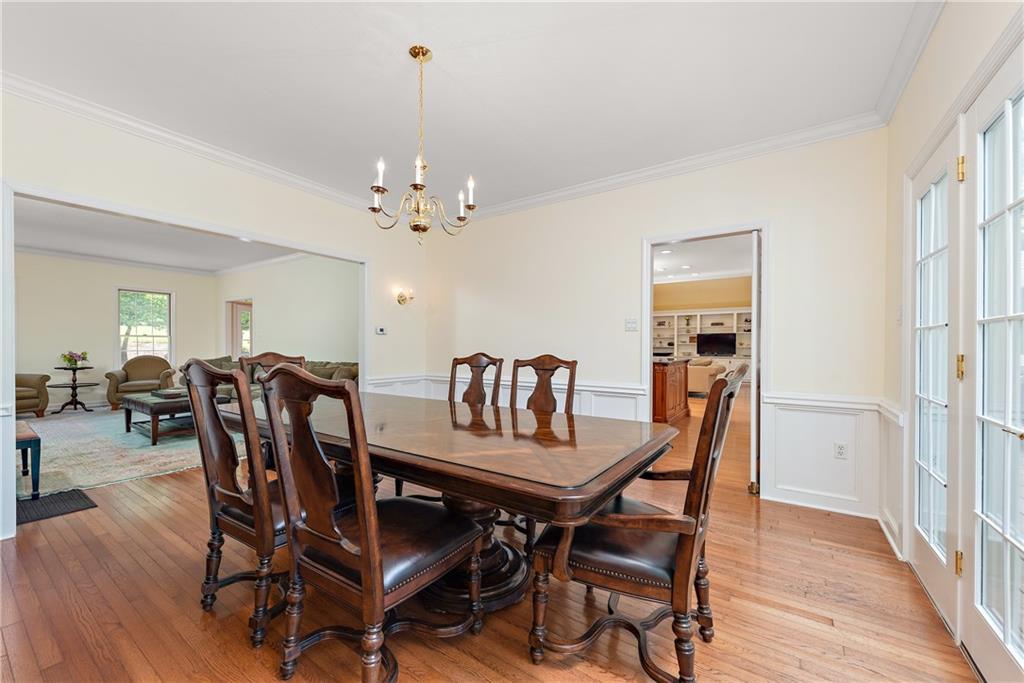 759 Chestnut Road Sewickley, PA 15143 - Photo 5 of 25 a view of a dining room with furniture and wooden floor