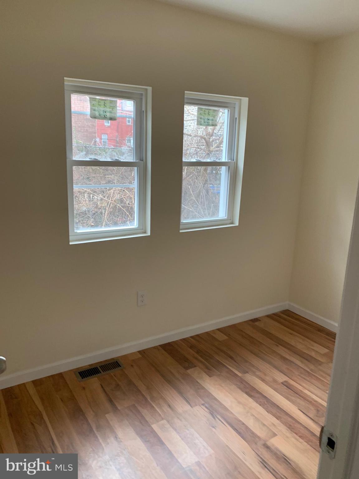 4840 North Camac Street, Unit 1 Philadelphia, PA 19141 - Photo 6 of 8 an empty room with a window