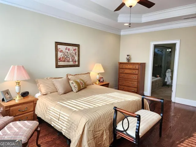 a large bathroom with a large tub and sink