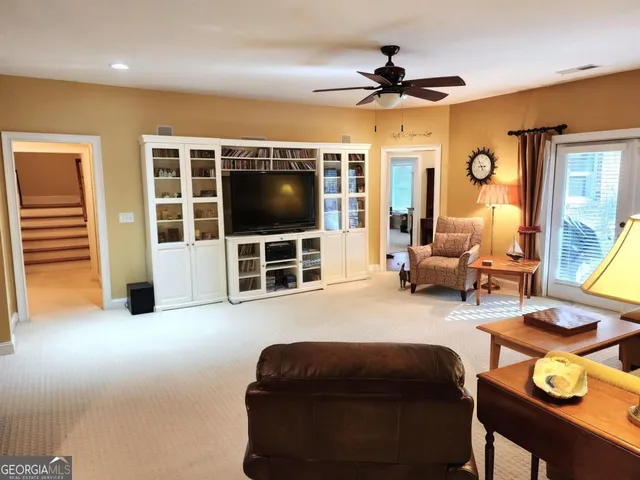 a bed room with a bed and a lamp