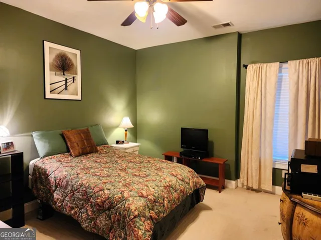 a view of a backyard with a trees