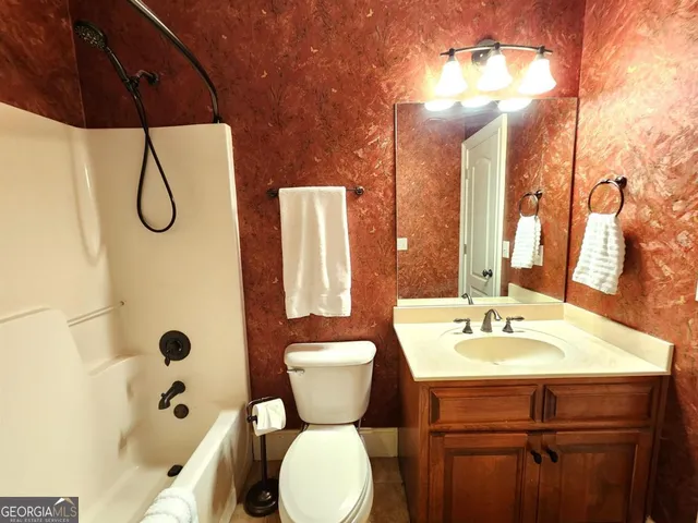 a view of a balcony with furniture and