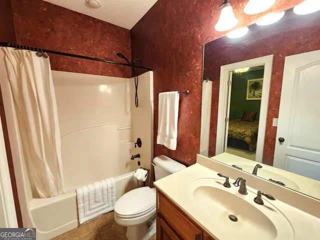 a backyard of a house with yard and outdoor seating