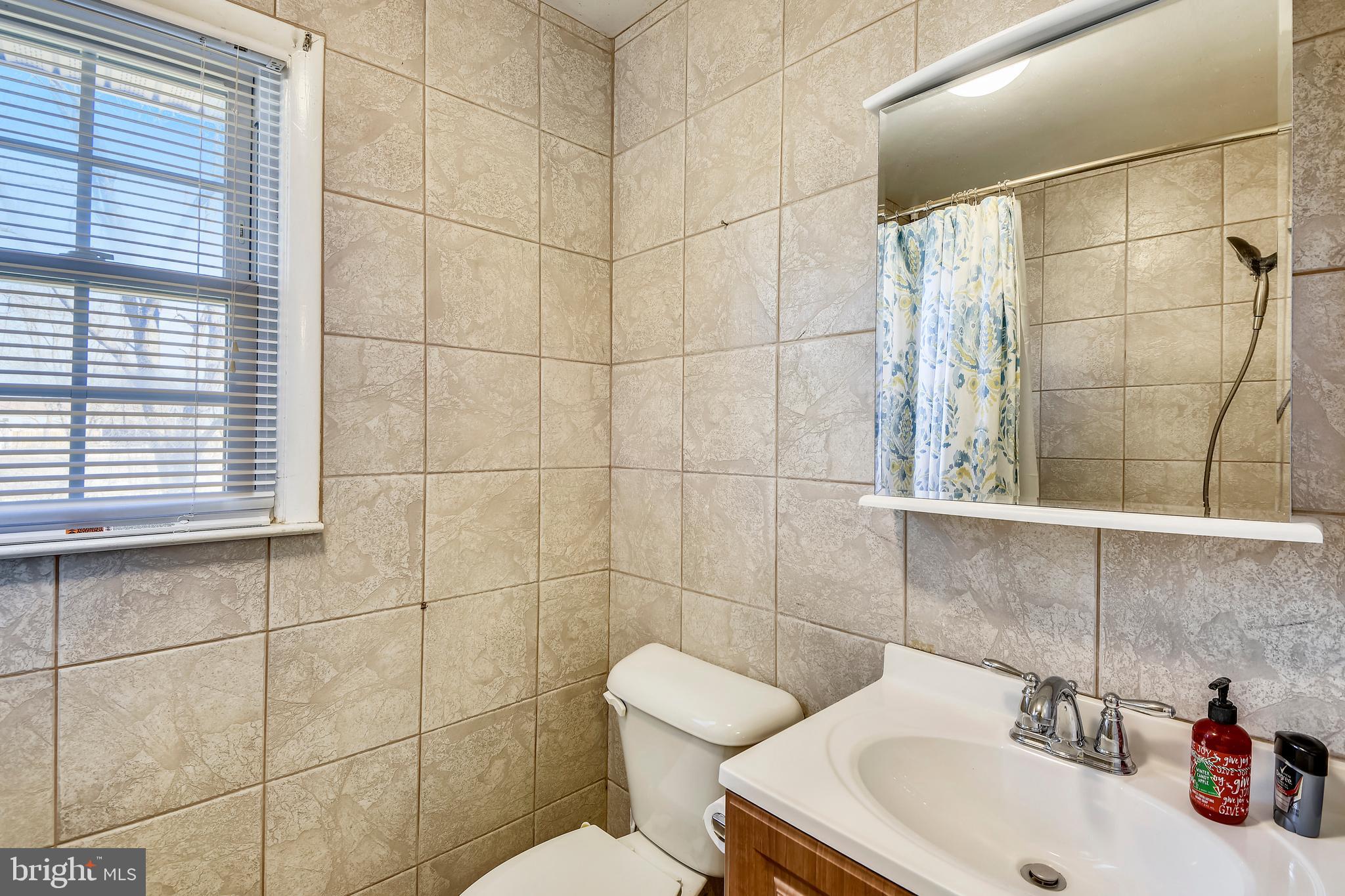 7837 Tick Neck Road Pasadena, MD 21122 - Photo 14 of 32 MAIN LEVEL BATH TOTALLY NEW 2015
