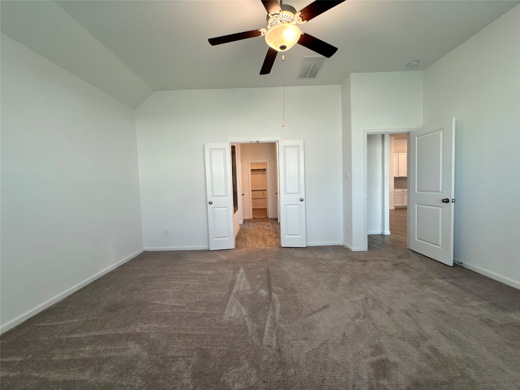 17311 Grand Canyon Road Conroe, TX 77302 - Photo 16 of 28 an empty room with closet and fan