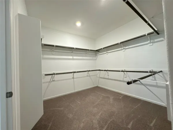 a view of a room with shelf on the wall