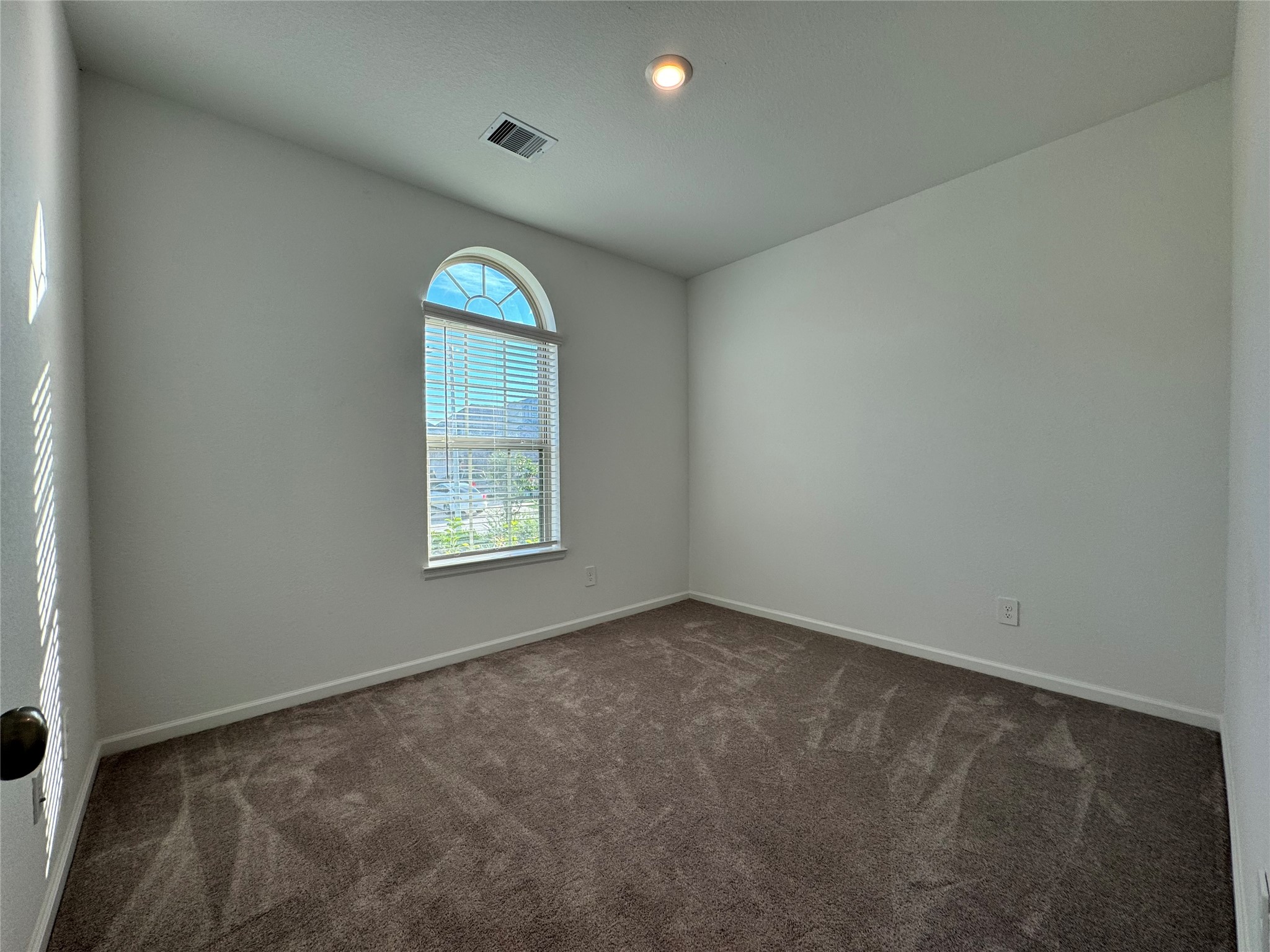 17311 Grand Canyon Road Conroe, TX 77302 - Photo 21 of 28 an empty room with windows
