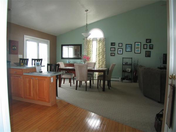 251 Mill Road Fairhaven, MA 02719 - Photo 4 of 14 a view of a dining room with furniture window and wooden floor