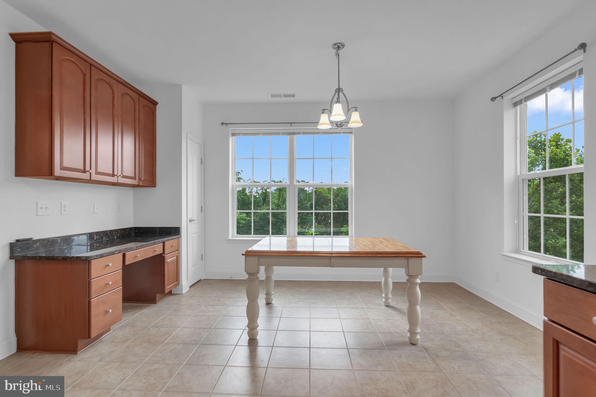 10273A Fountain Circle, Unit 306 Manassas, VA 20110 - Photo 14 of 33 a room with furniture and window
