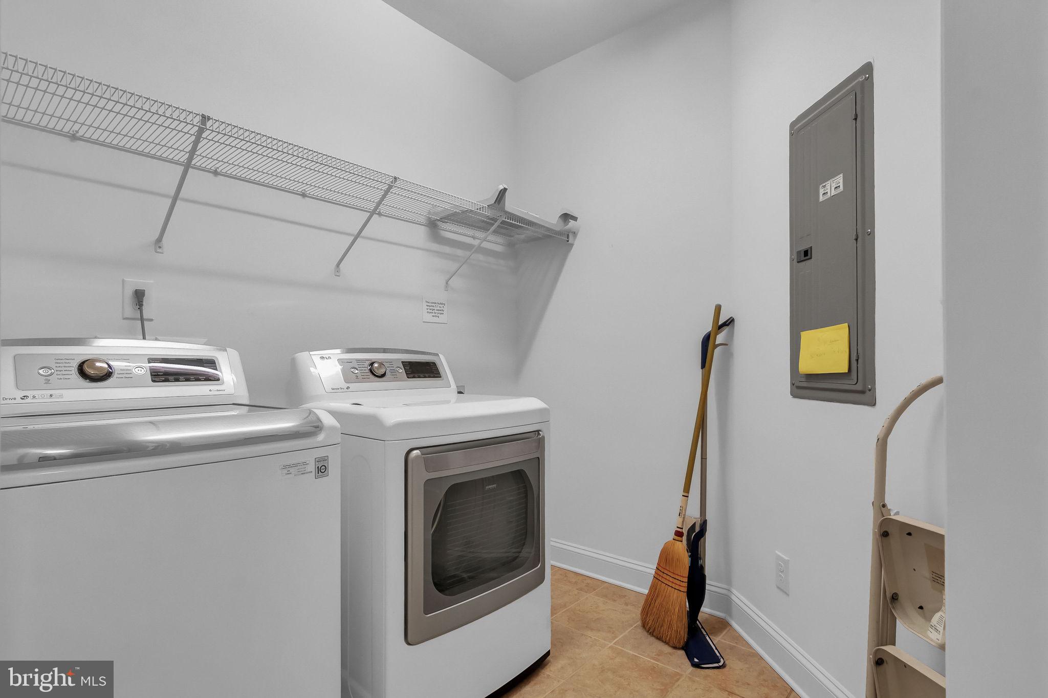 10273A Fountain Circle, Unit 306 Manassas, VA 20110 - Photo 29 of 33 a utility room with dryer and washer