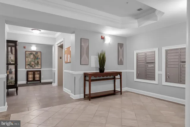 a view of workspace with furniture and window