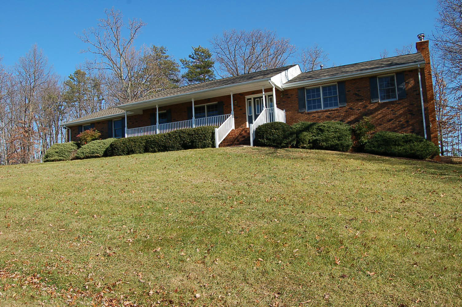 198 Oak Ridge Court Blue Ridge, VA 24064 - Photo 2 of 33 a view of a house with a yard and potted plants