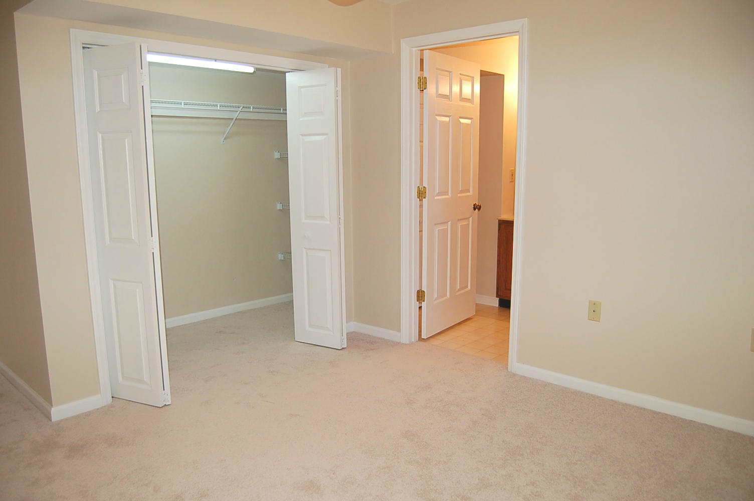 198 Oak Ridge Court Blue Ridge, VA 24064 - Photo 24 of 33 an empty room with windows and closet