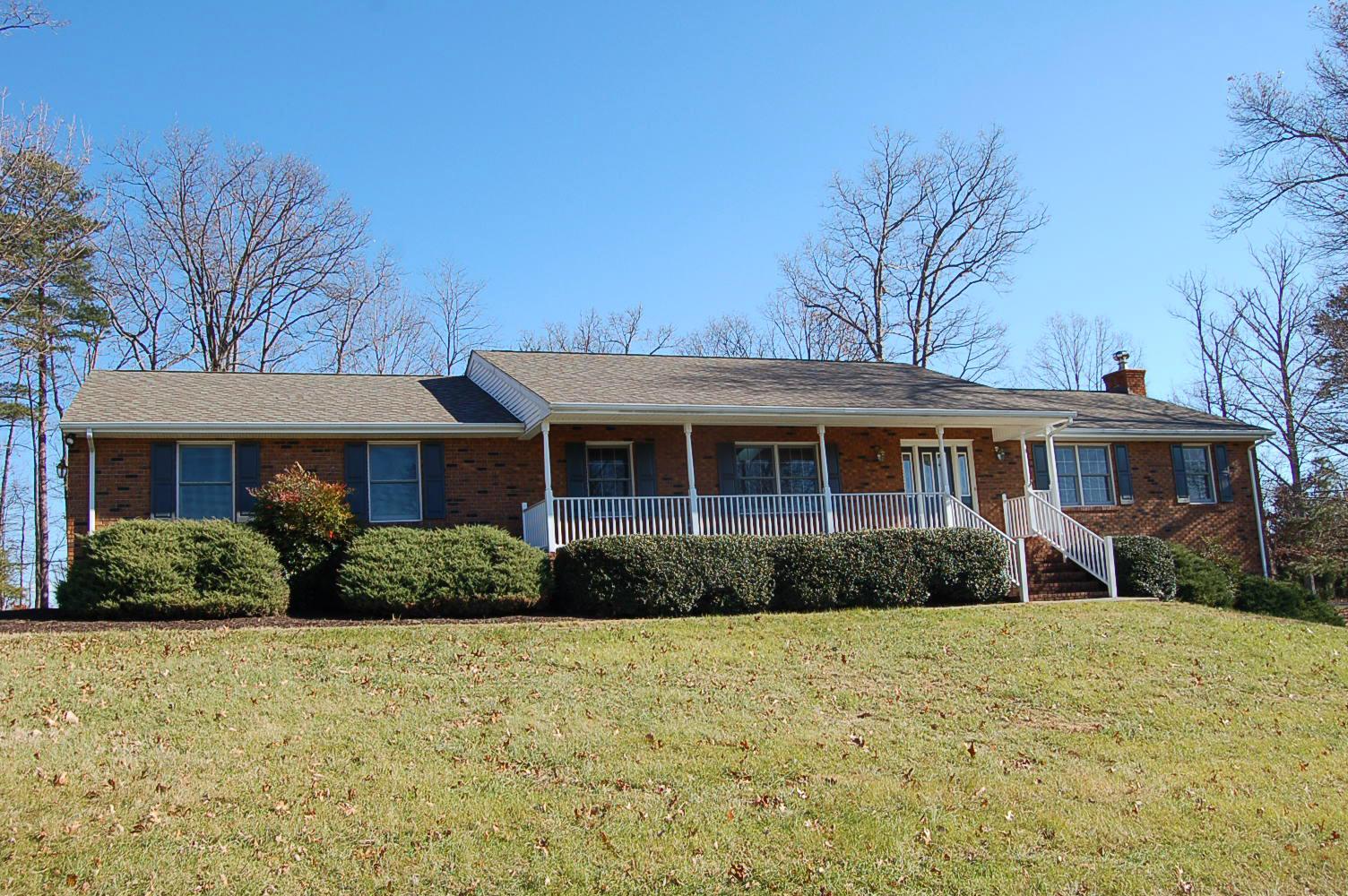 198 Oak Ridge Court Blue Ridge, VA 24064 - Photo 4 of 33 a front view of a house with a yard