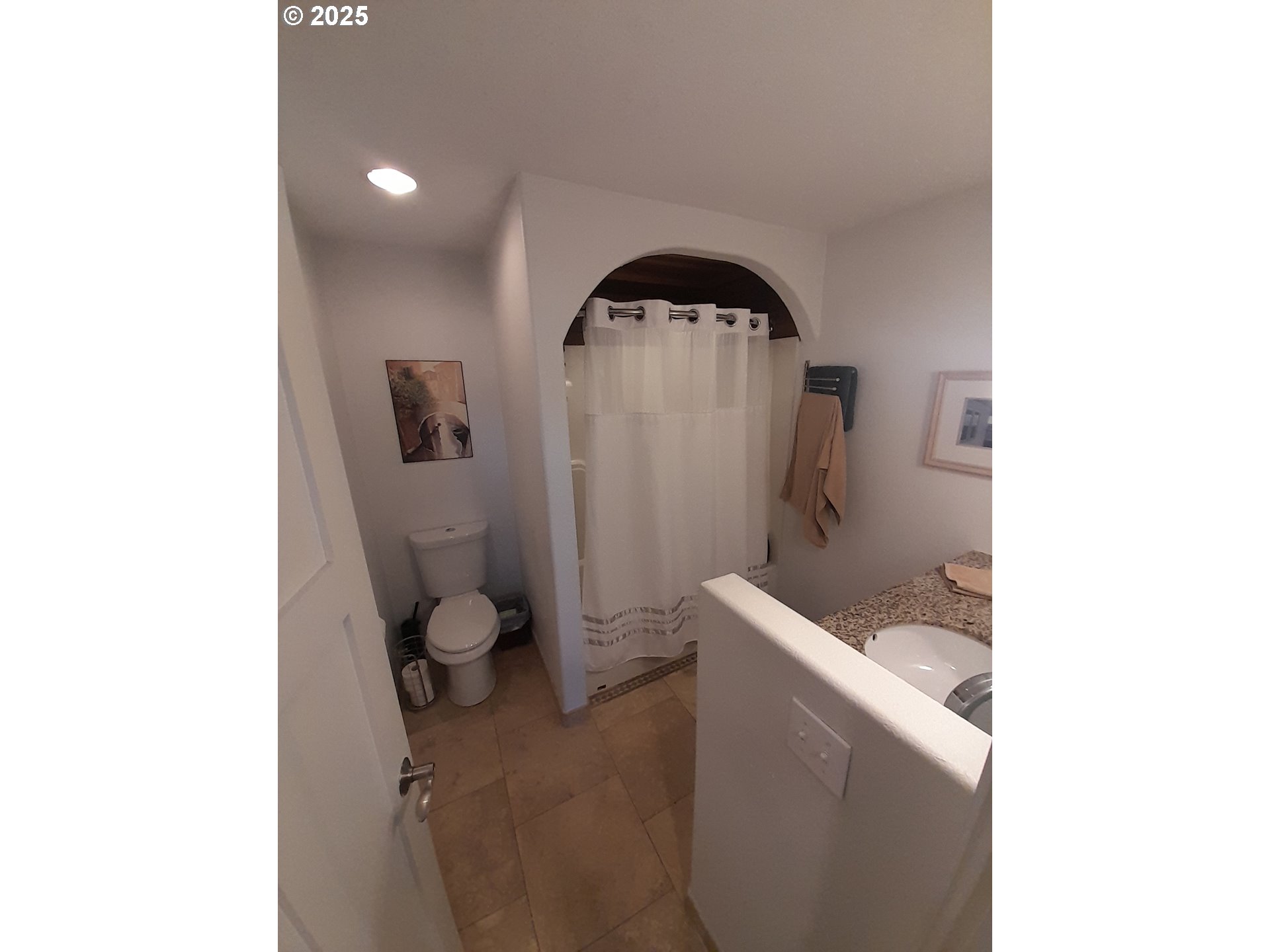 3449 Northeast West Devils Lake Road Lincoln City, OR 97367 - Photo 20 of 48 a close view of a toilet in a bathroom