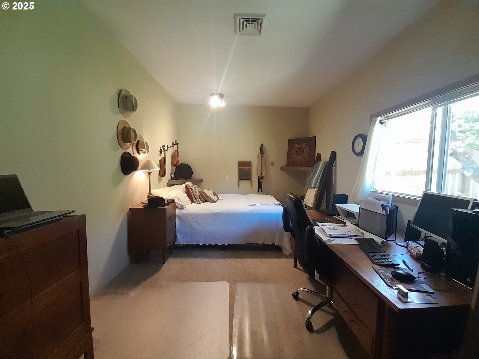 3449 Northeast West Devils Lake Road Lincoln City, OR 97367 - Photo 25 of 48 a bedroom with a workspace