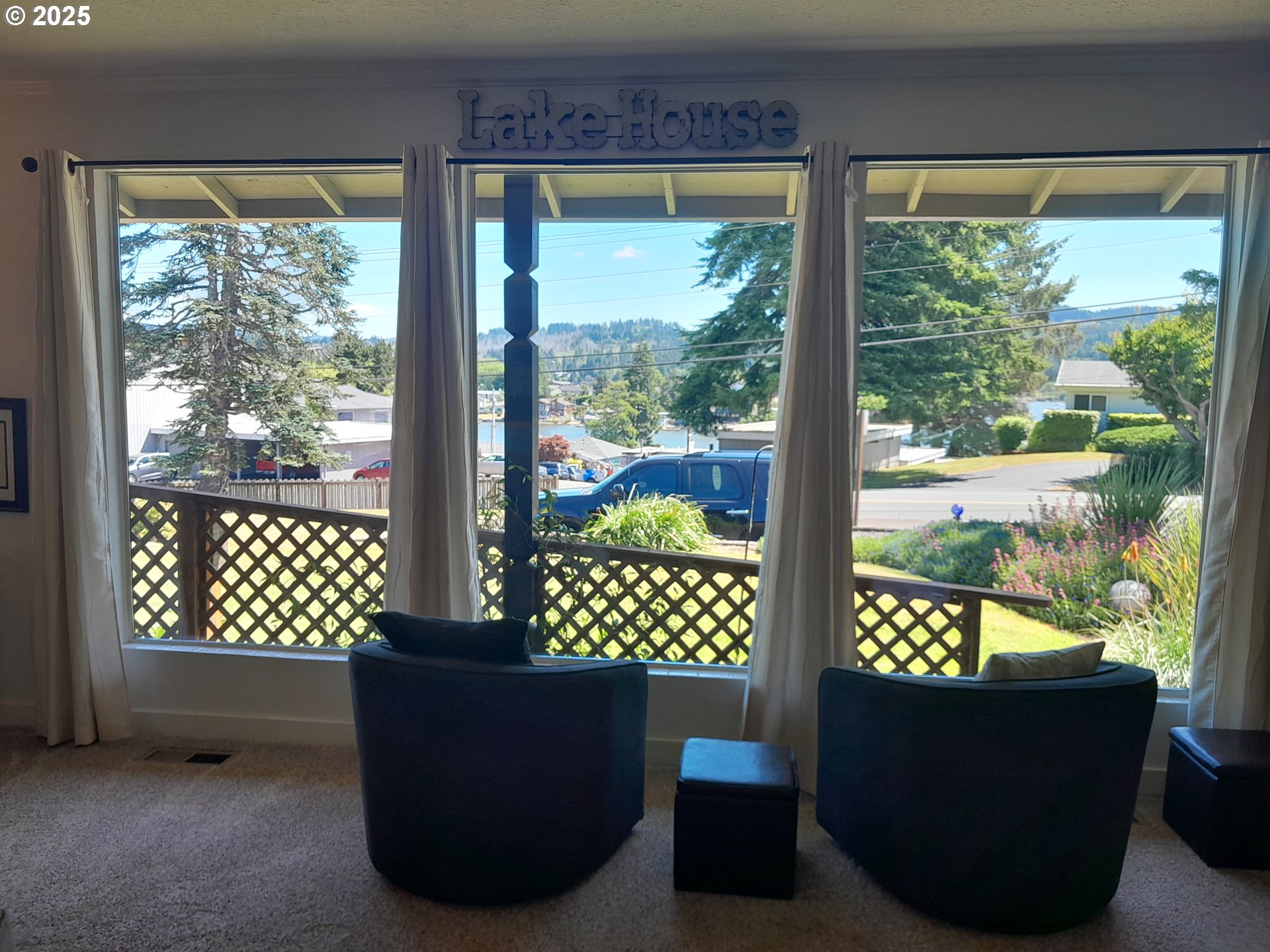 3449 Northeast West Devils Lake Road Lincoln City, OR 97367 - Photo 6 of 48 a view of a window and outdoor view