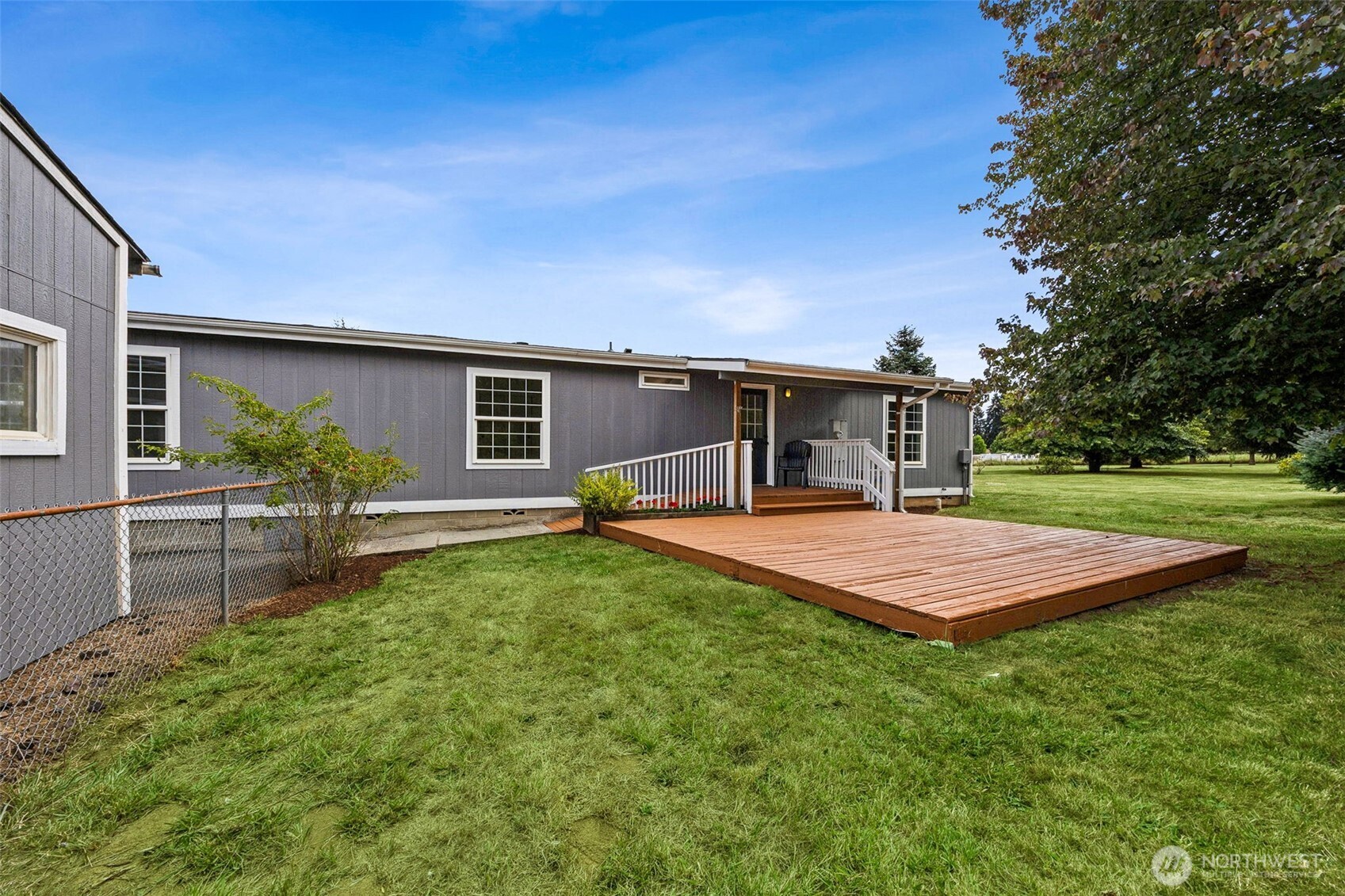 125 Highland Road Winlock, WA 98596 - Photo 27 of 40 a front view of house with yard and outdoor seating