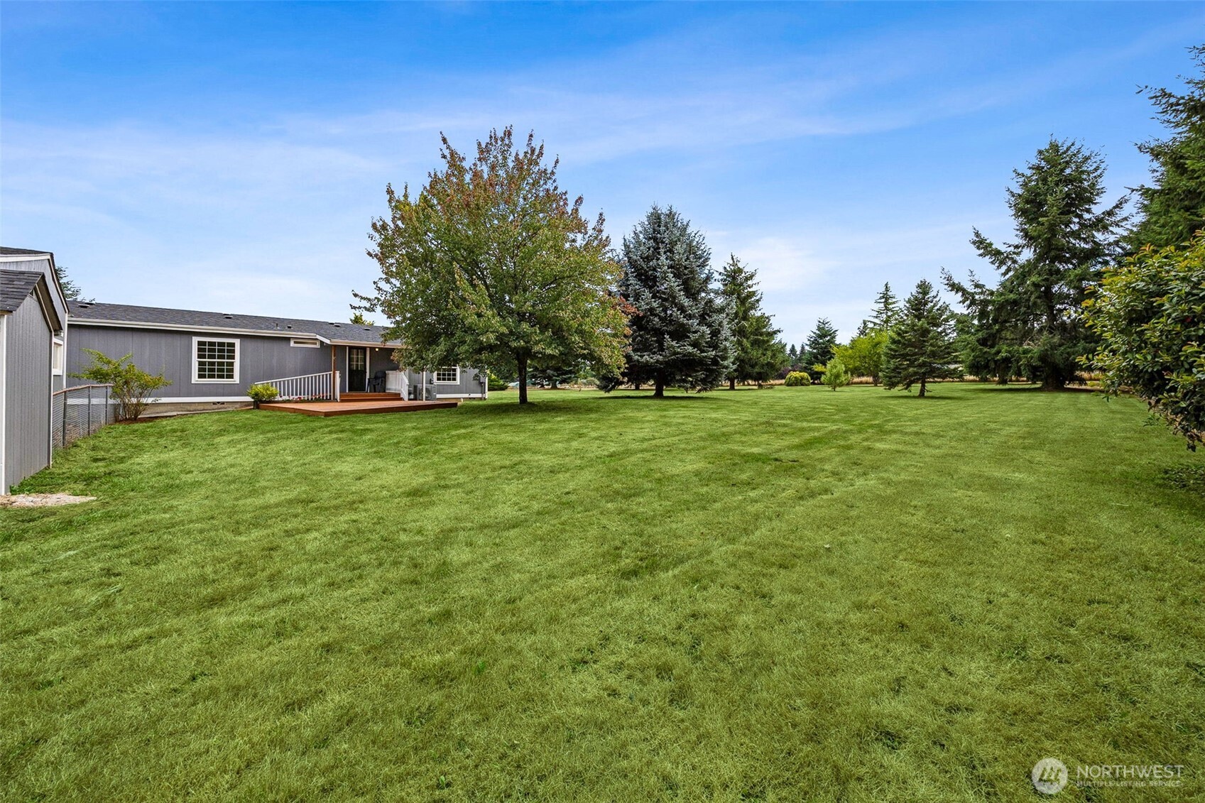 125 Highland Road Winlock, WA 98596 - Photo 28 of 40 a view of a house with a big yard