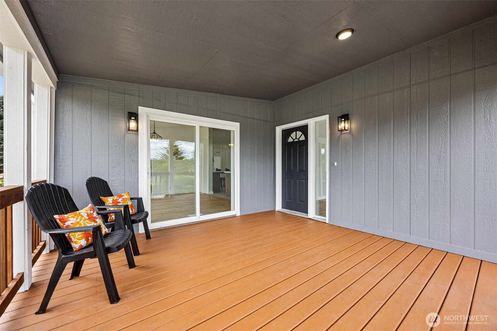 125 Highland Road Winlock, WA 98596 - Photo 3 of 40 a balcony with furniture and wooden floor