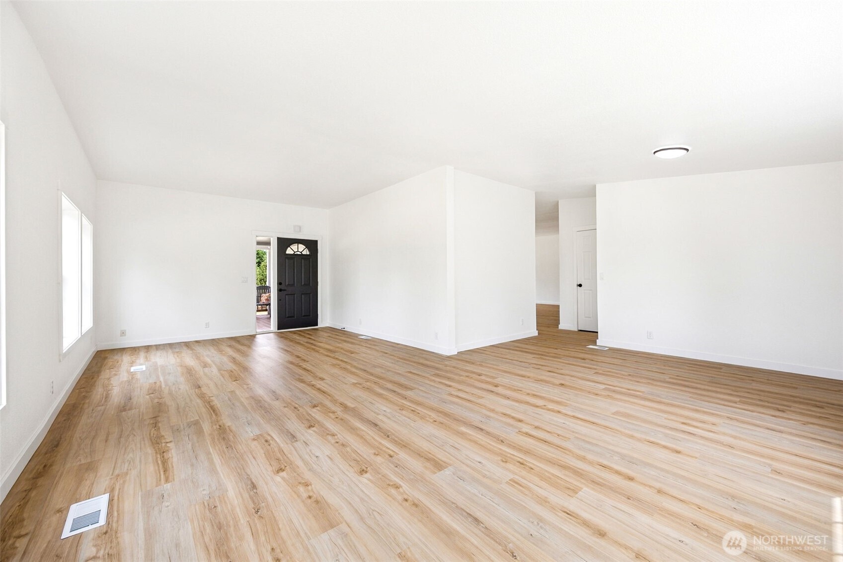 125 Highland Road Winlock, WA 98596 - Photo 8 of 40 a view of empty room with wooden floor