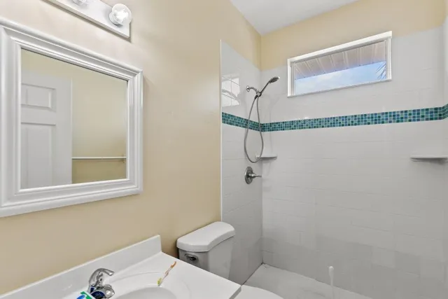 a view of livingroom with hardwood floor and a ceiling fan