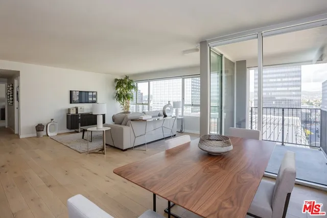 a bedroom with a bed and a lamp