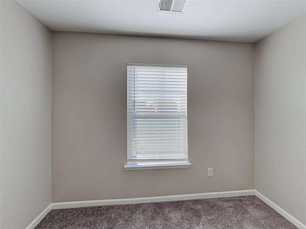 3144 Broadleaf Trail Road Fairburn, GA 30213 - Photo 16 of 21 a view of a window in an empty room