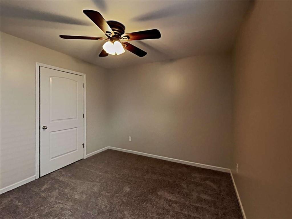 3144 Broadleaf Trail Road Fairburn, GA 30213 - Photo 19 of 21 a view of an empty room