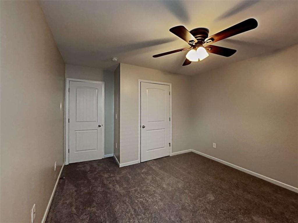 3144 Broadleaf Trail Road Fairburn, GA 30213 - Photo 20 of 21 a view of an empty room