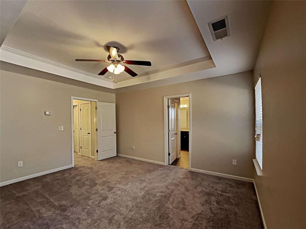 3144 Broadleaf Trail Road Fairburn, GA 30213 - Photo 3 of 21 a view of a livingroom with a ceiling fan and chandelier fan