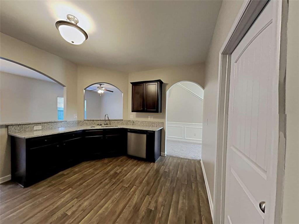 3144 Broadleaf Trail Road Fairburn, GA 30213 - Photo 7 of 21 a spacious bathroom with a granite countertop sink toilet and a mirror