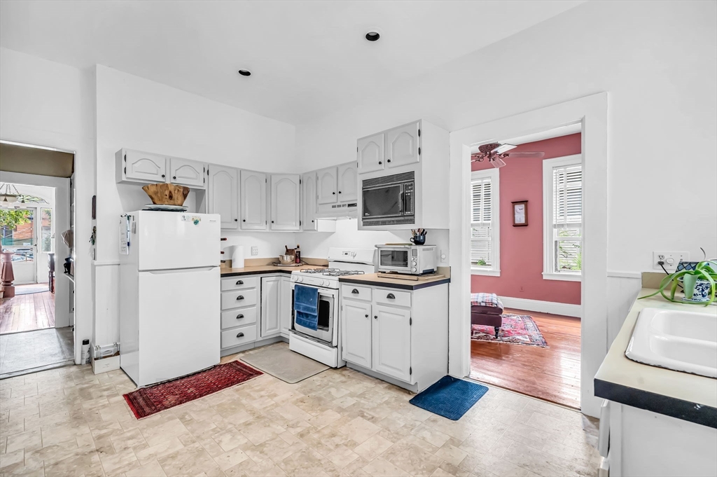 33 Madison Avenue Springfield, MA 01105 - Photo 10 of 32 a kitchen with a refrigerator stove and sink
