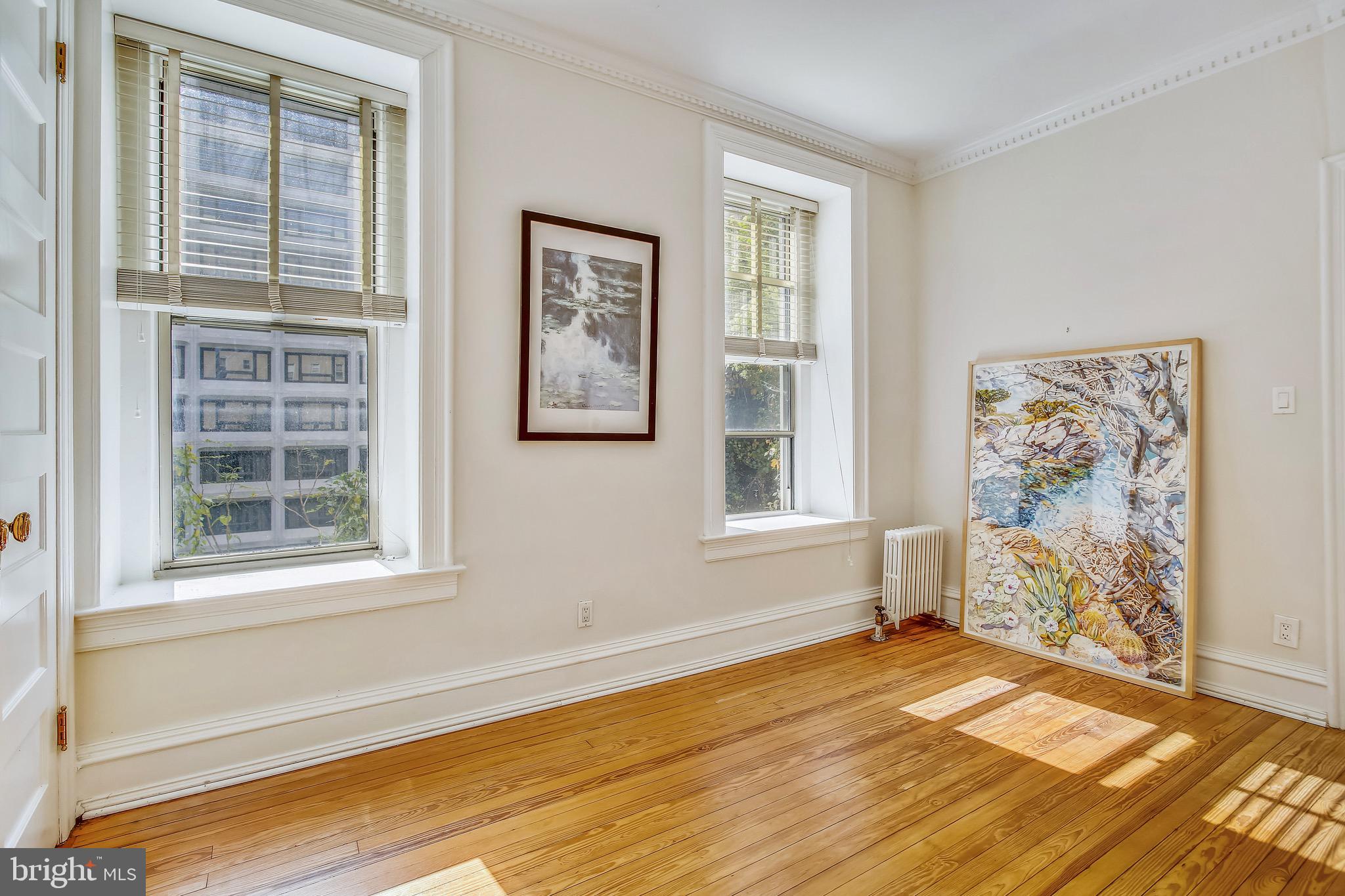 2022 Columbia Road Northwest, Unit 107 Washington, DC 20009 - Photo 22 of 47 Primary Bedroom and Windows Looking South