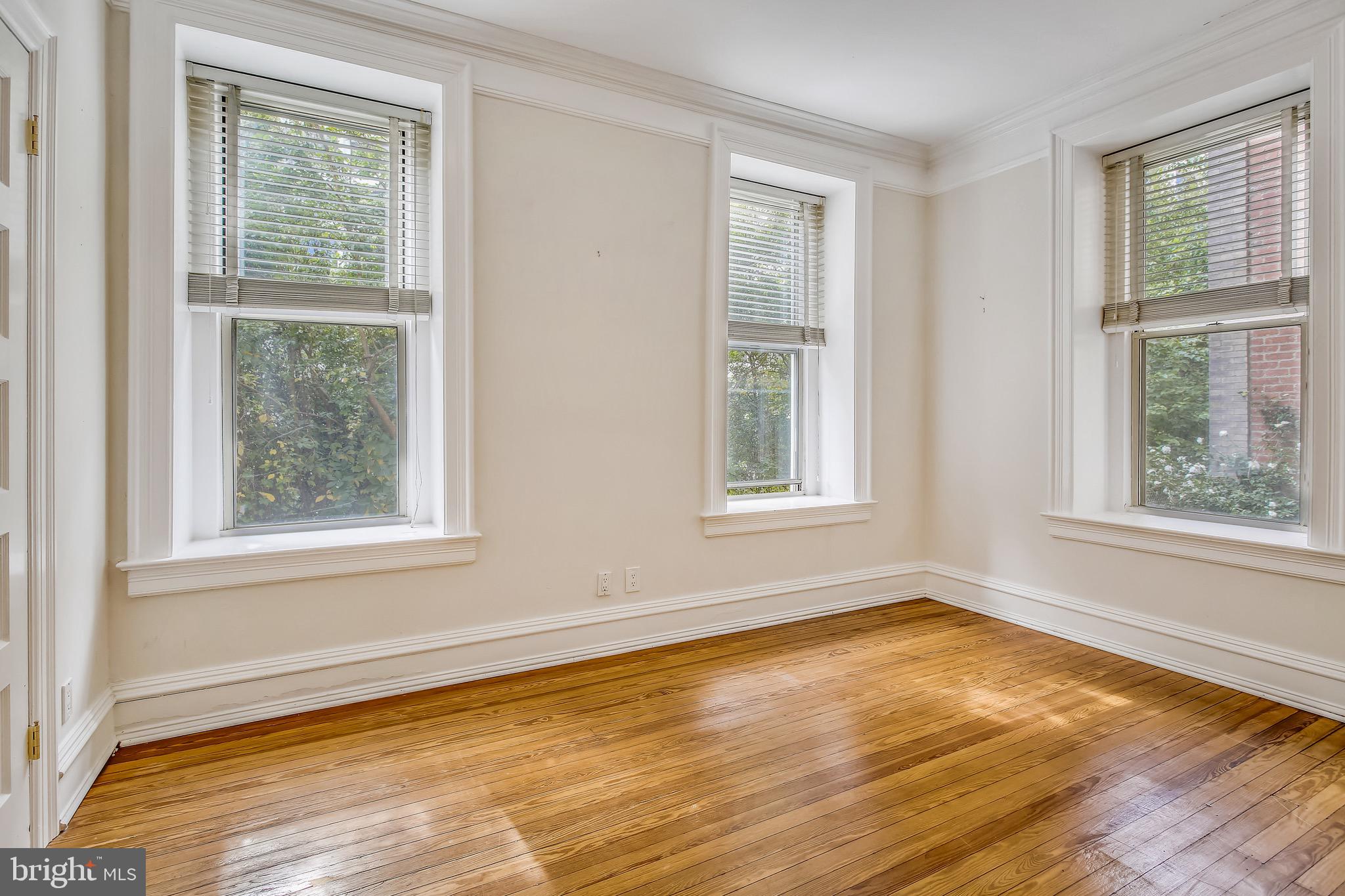 2022 Columbia Road Northwest, Unit 107 Washington, DC 20009 - Photo 29 of 47 Second Bedroom/Study with three windows