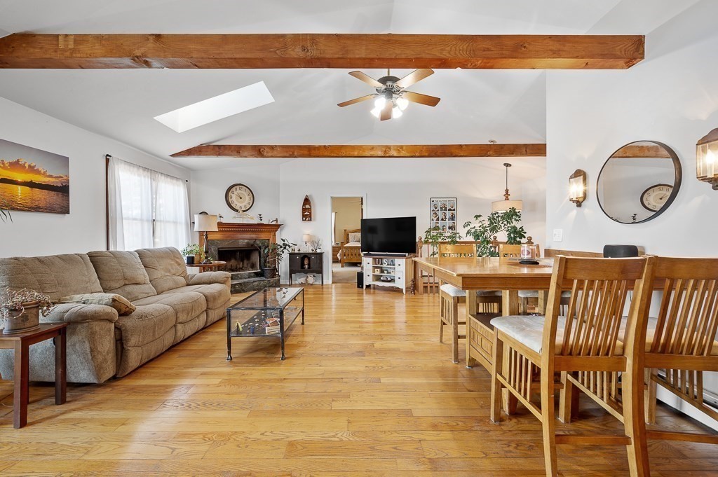 25 Bates Grove Road Webster, MA 01570 - Photo 11 of 42 a living room with furniture and kitchen view