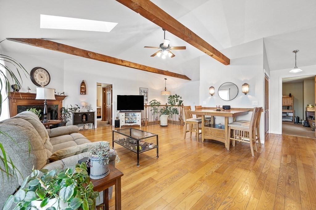 25 Bates Grove Road Webster, MA 01570 - Photo 12 of 42 a living room with furniture kitchen view and a large window
