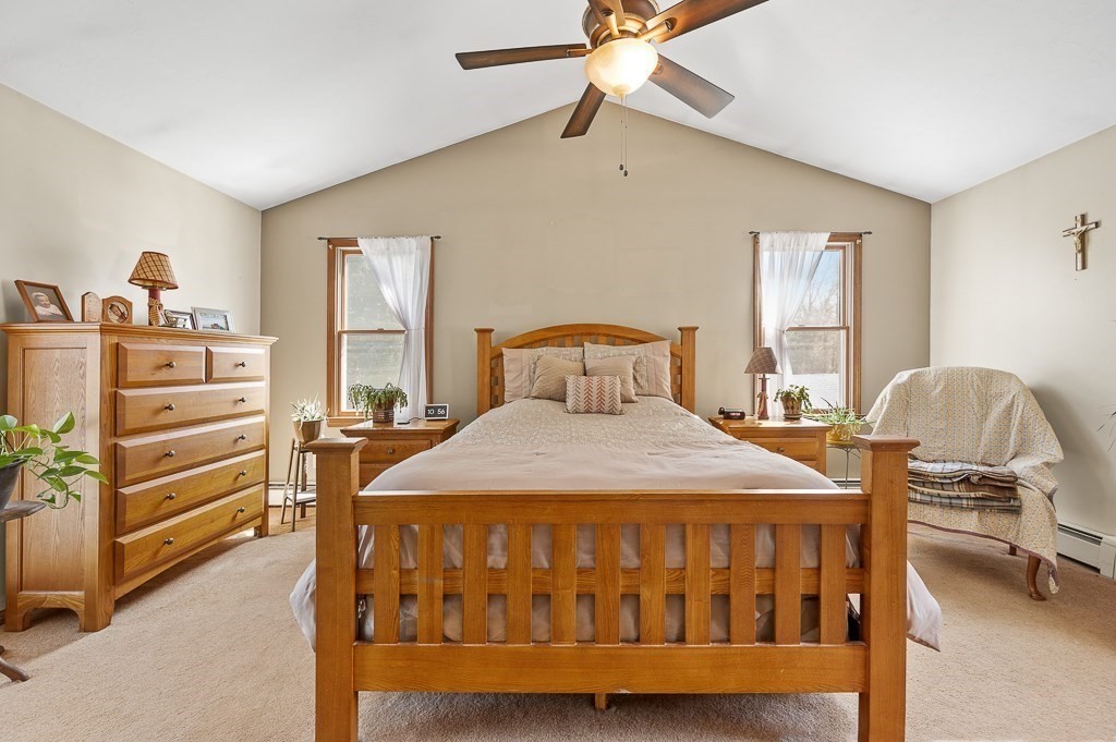 25 Bates Grove Road Webster, MA 01570 - Photo 18 of 42 a bedroom with a bed and a window
