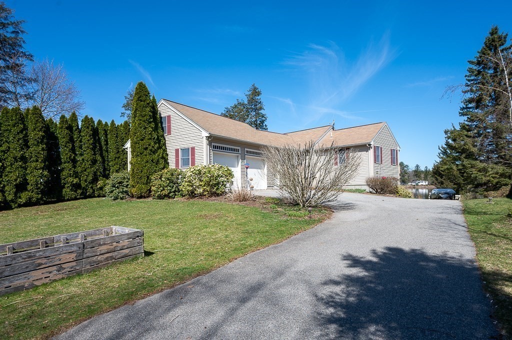 25 Bates Grove Road Webster, MA 01570 - Photo 3 of 42 a view of a house with a yard