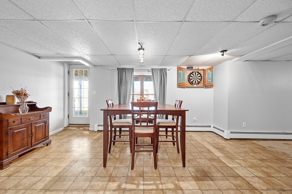 25 Bates Grove Road Webster, MA 01570 - Photo 31 of 42 a view of a dining room with furniture