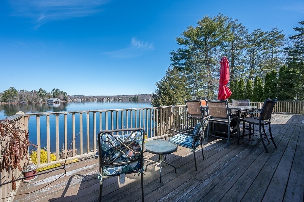 25 Bates Grove Road Webster, MA 01570 - Photo 35 of 42 a view of a chairs and table on the deck