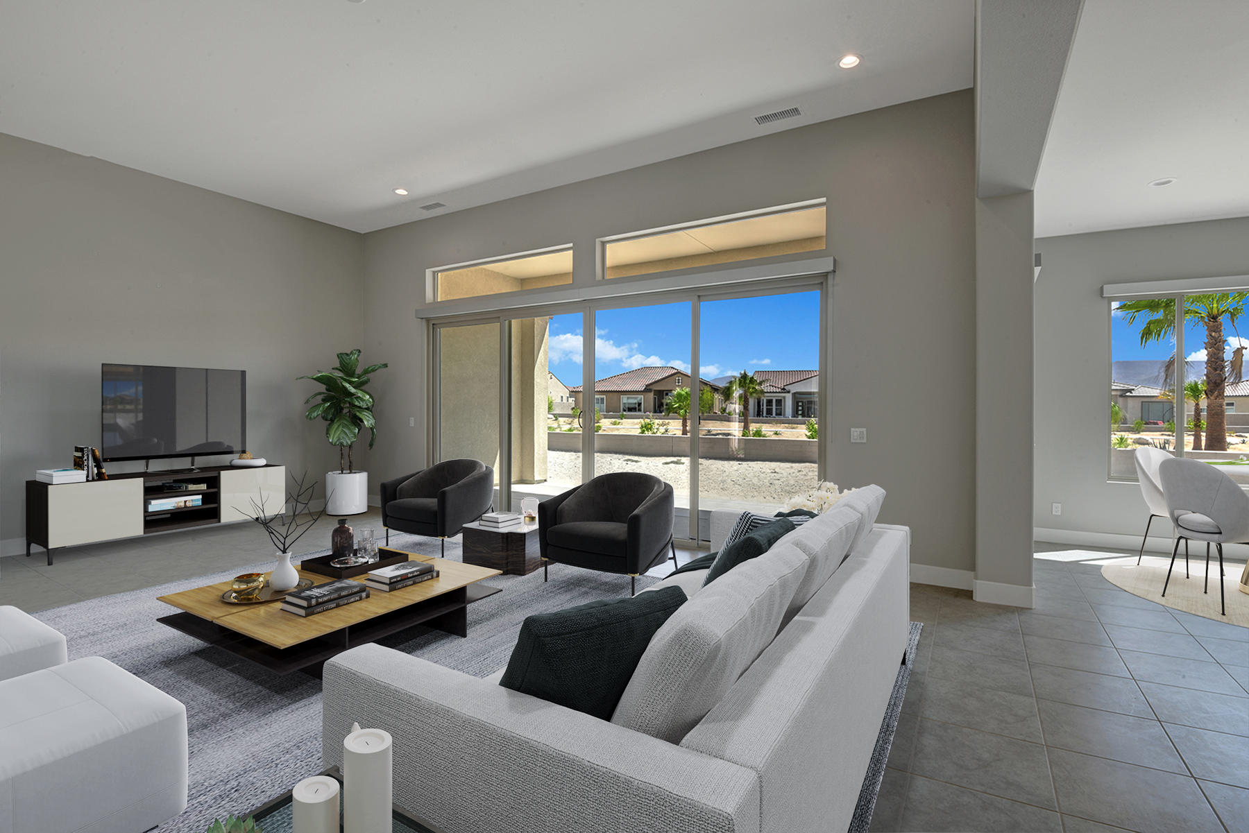 52 Cork Tree Rancho Mirage, CA 92270 - Photo 11 of 47 LIVING ROOM AND DINING ROOM TO BACK YARD