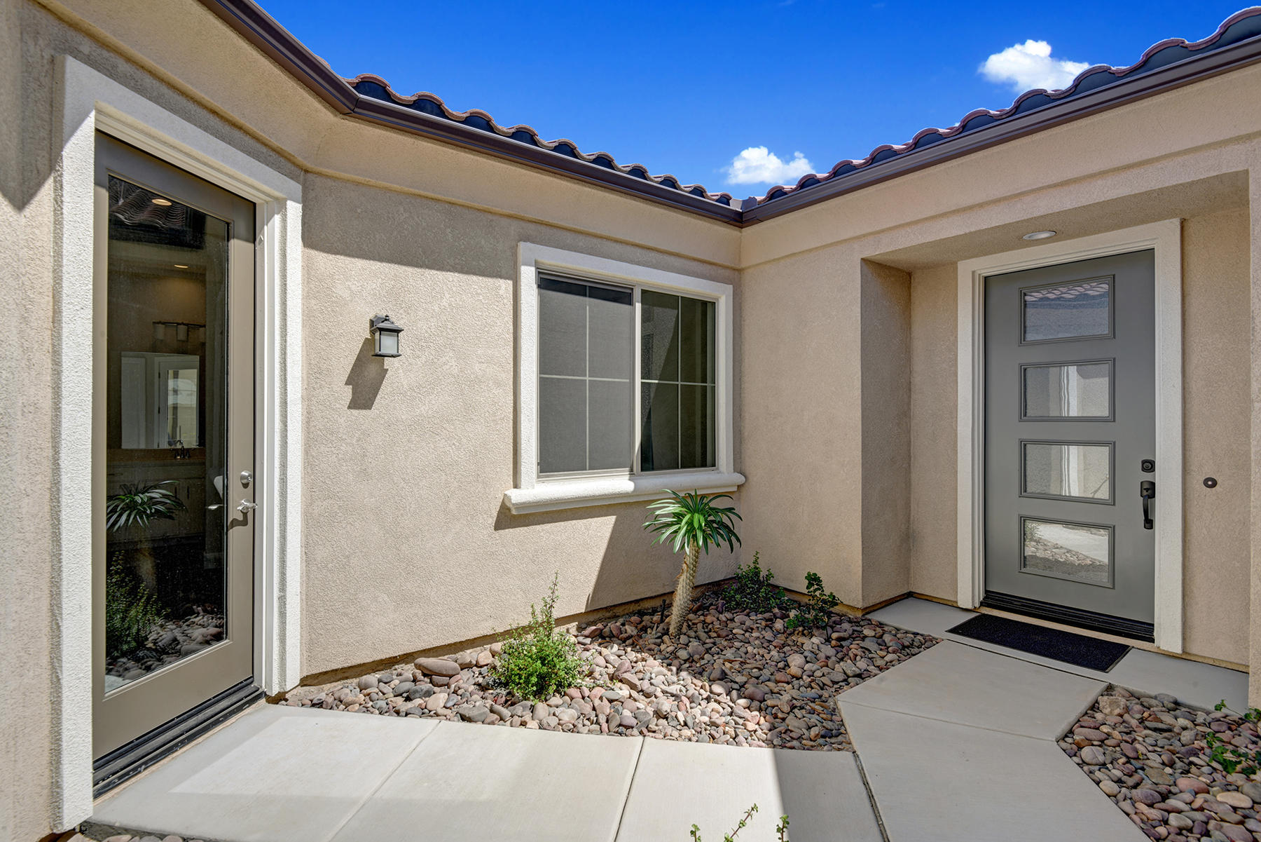 52 Cork Tree Rancho Mirage, CA 92270 - Photo 3 of 47 ENTRY COURTYARD WITH CASITA ENTRY MLS