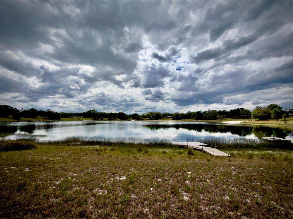 0 Southeast 146th Terrace Road Ocklawaha, FL 32179 - Photo 2 of 15 a view of a lake