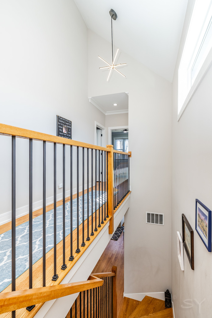5739 West Grover Street Chicago, IL 60630 - Photo 15 of 38 a view of a hallway with windows