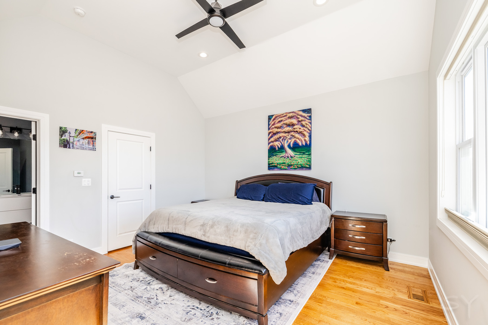 5739 West Grover Street Chicago, IL 60630 - Photo 17 of 38 a bedroom with a bed and a desk